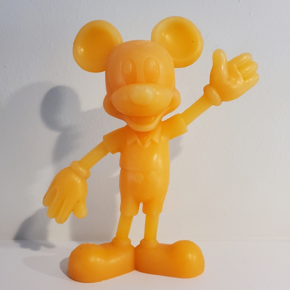 Vintage '70s Marx Toys Mickey Mouse toy in orange plastic